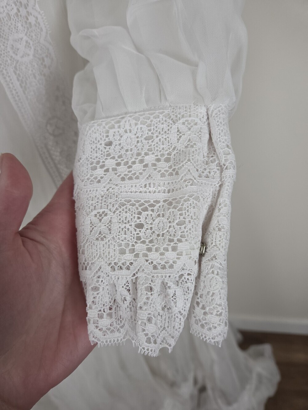 Victorian-Inspired White Lace Bridal Gown with High Neck and Sheer Puff Sleeves - Picture 9 of 13